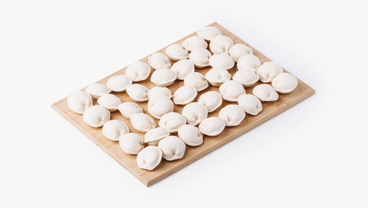 Пельмени "Том ям" с&nbsp;лососем, креветками и&nbsp;сыром