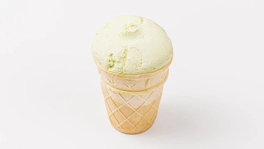 Пломбир фисташковый в вафельном стаканчике