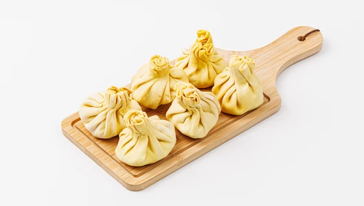 Хинкали с сыром сулугуни и кинзой