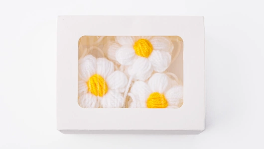 Гирлянда вязаная "Ромашки" Гирлянда вязаная "Ромашки"