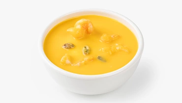 Крем-суп с тыквой и жареными креветками