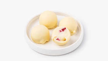 Изображение товара Мороженое пломбир Ванильный с малиной в белом шоколаде