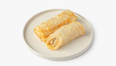 Изображение товара Сырные блины с филе индейки и луком в сливочном соусе