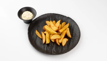 Изображение товара Картофельные дольки с соусом блю чиз жареные вкусные закуски