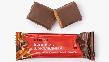Батончик шоколадный с&nbsp;арахисом, карамелью и&nbsp;изюмом