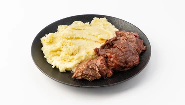 Изображение товара Щечки томленые с картофельным пюре - ароматное блюдо из телячьих щёчек и пюре
