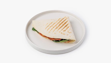 Изображение товара Тортилья с курицей и соусом спайси от кафе - свежая и ароматная