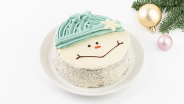 Изображение товара Бисквитный торт Снеговик с карамелью и арахисом 992 рублей