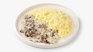 Щечки говяжьи томленные с грибным соусом и кускусом