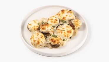 Изображение товара Шампиньоны фаршированные сыром и соусом бешамель
