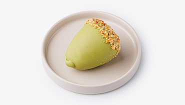 Изображение товара Пирожное-картошка Желудь в шоколаде матча - оригинальный десерт в форме жёлудя