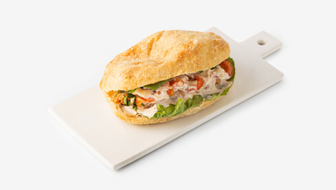 Изображение товара Панини цезарь на ляпуне пшенично-ржаном с курицей и соусом Цезарь 140 г