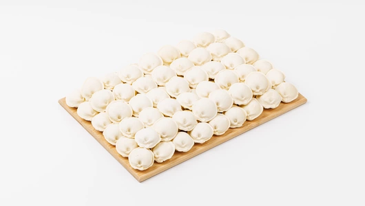 Пельмени с грудкой цыпленка-бройлера, грибами и сливочным маслом