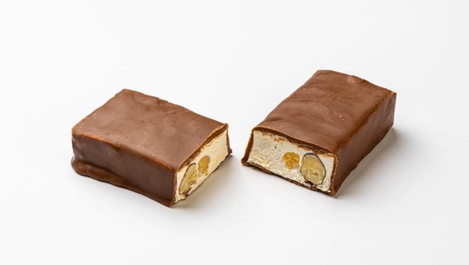 Нуга с фундуком в молочном шоколаде Нуга с фундуком в молочном шоколаде