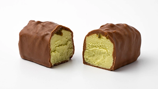 Сырок творожный с фисташкой в молочном шоколаде 26%