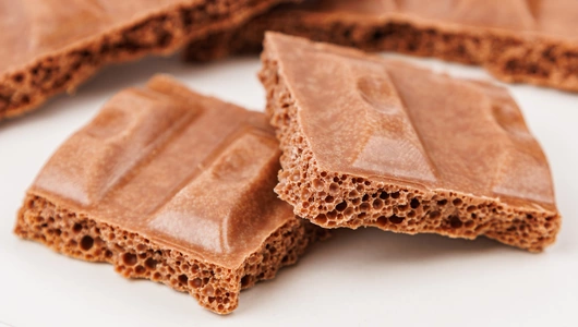 Шоколад молочный пористый