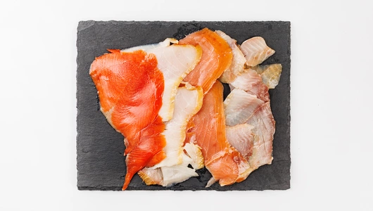 Ассорти х/к из кеты, масляной рыбы, нерки и омуля, 200 г Ассорти х/к из кеты, масляной рыбы, нерки и омуля, 200 г