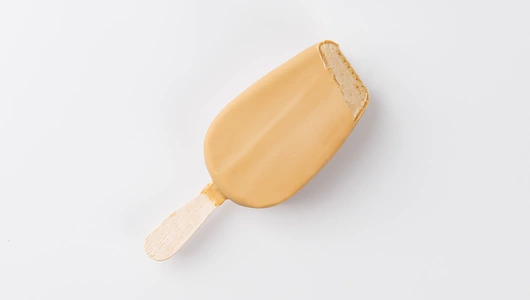 Эскимо пломбир с карамелью и ирисо-сливочн. вкус. в бел. шок.
