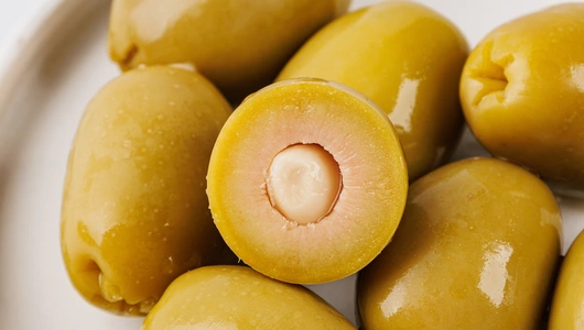 Оливки зеленые фаршированные чесноком, 120 г