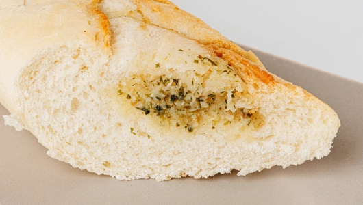 Багет пшеничный с чесноком, 170 г. Пекарня Багет пшеничный с чесноком, 170 г. Пекарня