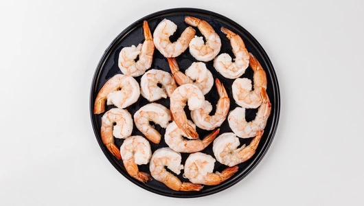 Креветки "Королевские" очищ. с хвостом бланш. 55/65 зам., 250 г Креветки "Королевские" очищ. с хвостом бланш. 55/65 зам., 250 г