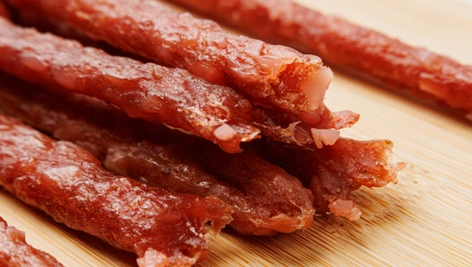 Колбаски из мяса индейки и курицы с сыром "Пармезан", сырокопченые