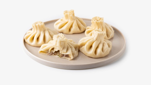 Хинкали ручной лепки с говядиной и свининой