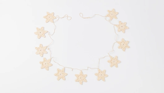 Гирлянда вязаная "Снежинки" Гирлянда вязаная "Снежинки"