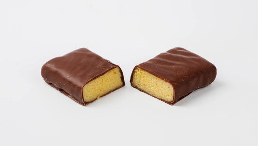 Батончик марципановый "Апельсинка" в тем.шоколаде