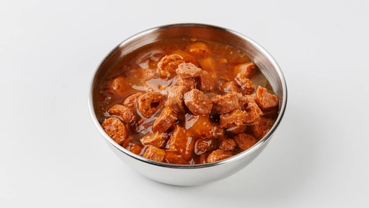 Корм влажный для кошек "Ассорти с ягненком" в соусе, 85 гр Корм влажный для кошек "Ассорти с ягненком" в соусе, 85 гр