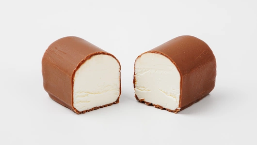 Сырок творожный ванильный с несладким творогом в молочном шок. 15% Сырок творожный ванильный с несладким творогом в молочном шок. 15%