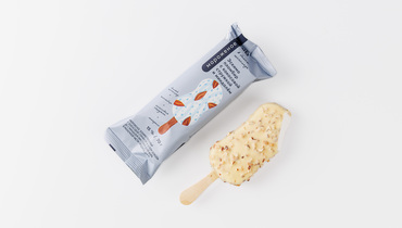 Изображение товара Эскимо пломбир с кокосовой стружкой и миндалем в белом шоколаде 70 г