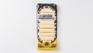 Изображение товара Сыр Грюйер в рулетиках 6 мес 100 г швейцарский твердый сыр