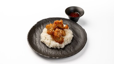 Изображение товара Куриное филе в кляре с рисом и кисло-сладким соусом